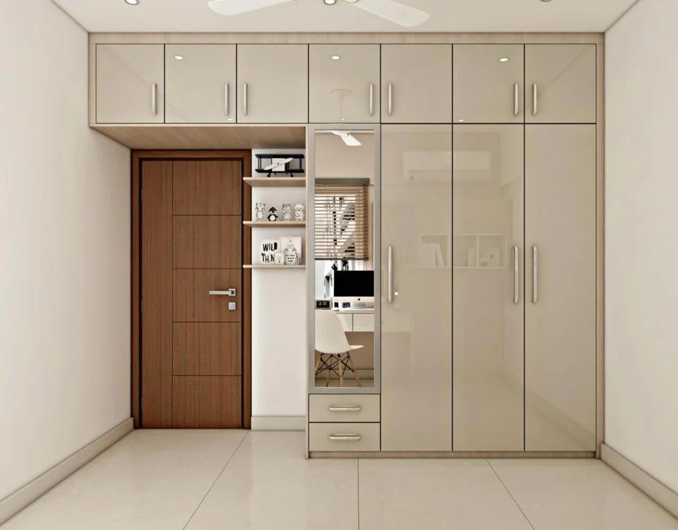 Modern bedroom storage system with glossy cabinets, mirrored section, and wood door.