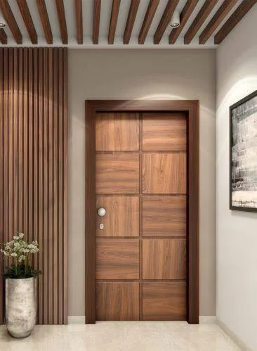 Modern wooden door with square panels and slatted wood wall in minimalist entryway.