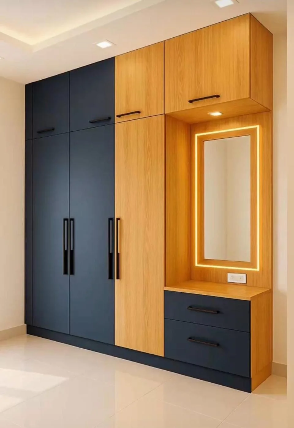 Two-tone wardrobe with LED mirror and built-in storage.