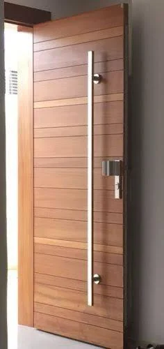 Modern wooden door with long silver handle.