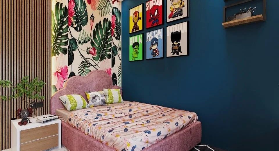 A child's bedroom with pink bed, superhero art, floral wallpaper, and navy walls.